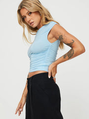 A Sleeveless Pleated Blouse With A slanted Collar