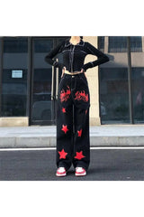 Jean noir et rouge à étoiles d'automne