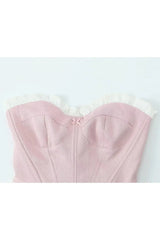 Zartrosa Korsett mit Rüschen und Herzausschnitt