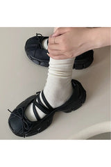 Chaussures à plateforme avec nœud papillon