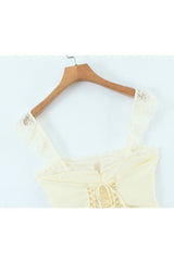 Mini-robe chic et ajustée dos nu