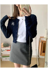 Cardigan boutonné en maille torsadée confortable pour l'automne