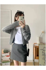 Cardigan boutonné en maille torsadée confortable pour l'automne