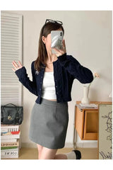 Cardigan boutonné en maille torsadée confortable pour l'automne