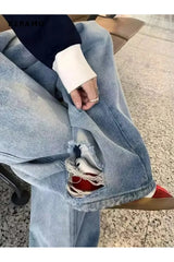 Jean large délavé clair effet usé