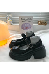 Chaussures Mary Janes à plateforme noires brillantes