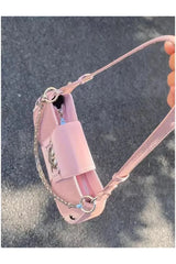 Sac à main gothique pastel en peluche avec croix