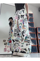 Pantalon large à imprimé graffiti