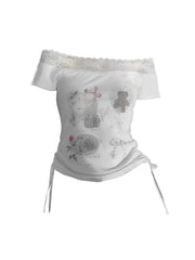Lace-Trimmed Off-Shoulder Graphic Top