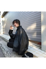 Veste chemise en cuir noir surdimensionnée d'automne