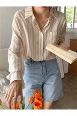 Chemisier à poches surdimensionné à rayures