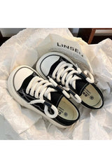 Chaussures à lacets roses