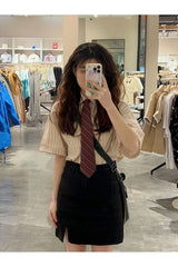 Chemise à rayures style preppy