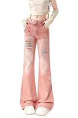 Jeans im Used-Look mit Sternenmuster in Pink