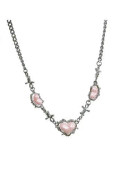 Design einer dornigen Opal-Herzkette