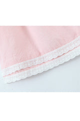 Mini-robe à carreaux avec col noué