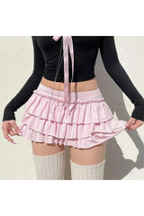 Jupe rose à volants étagés
