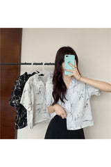 Sommerhemd mit V-Ausschnitt und Knopfdruck