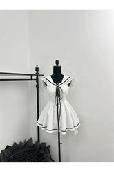 Robe victorienne en dentelle avec nœud papillon