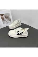 Weiße klobige Sneakers