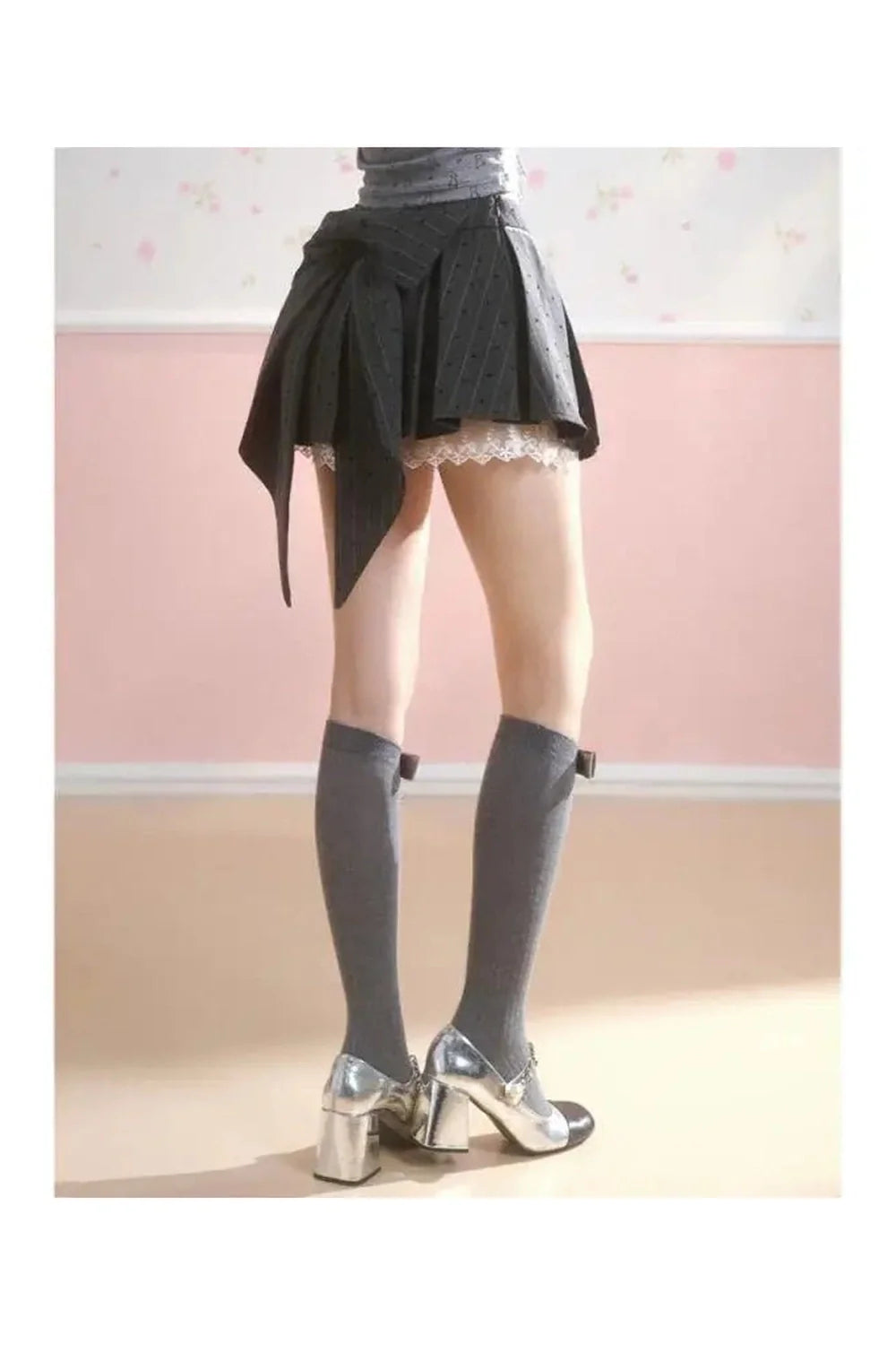 Asymmetrical Bow Tie Mini Skirt