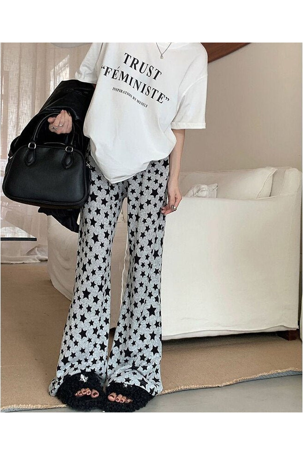 Pantalon évasé à imprimé étoiles grunge