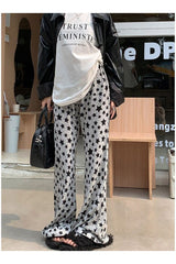 Pantalon évasé à imprimé étoiles grunge