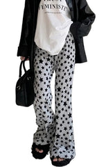 Pantalon évasé à imprimé étoiles grunge