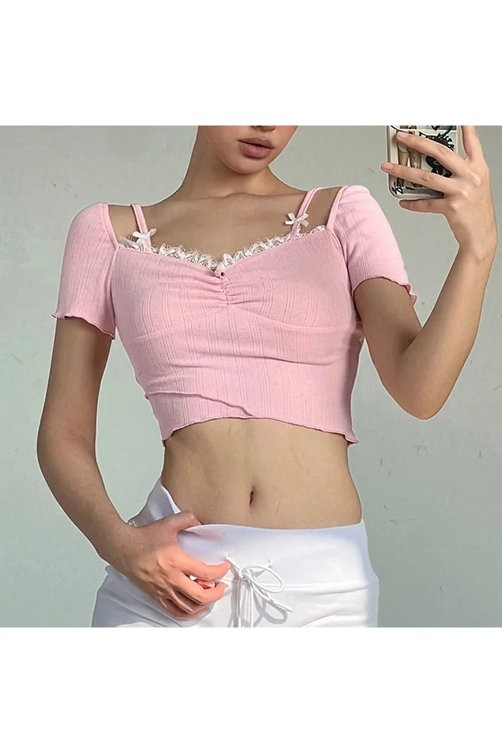 Rosa Crop-Top mit Spitzenbesatz und Schleife