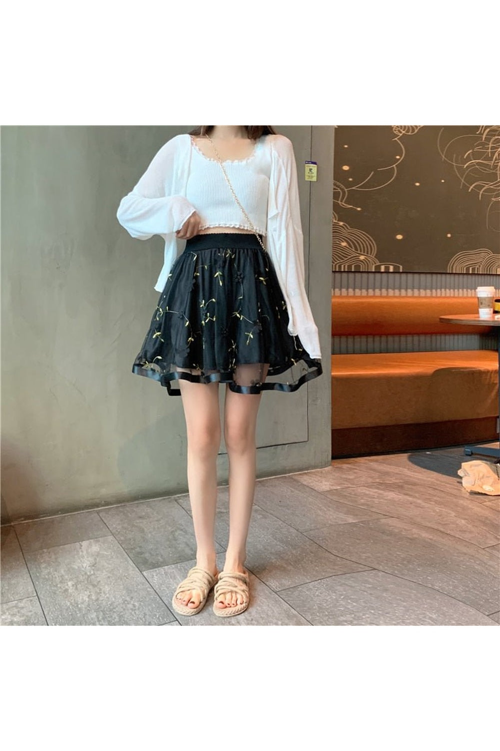 Mini-jupe fleurie en maille preppy