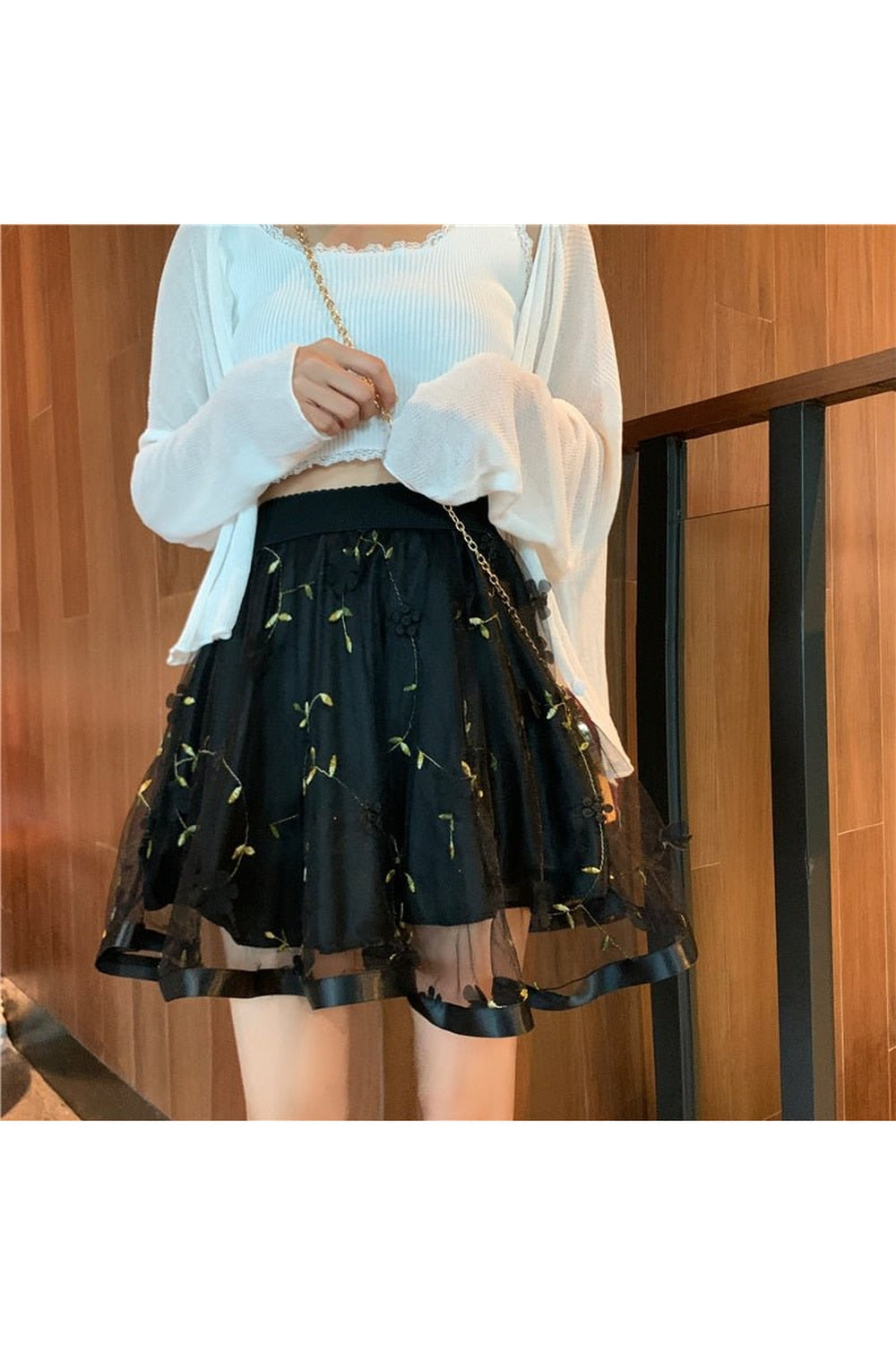 Mini-jupe fleurie en maille preppy