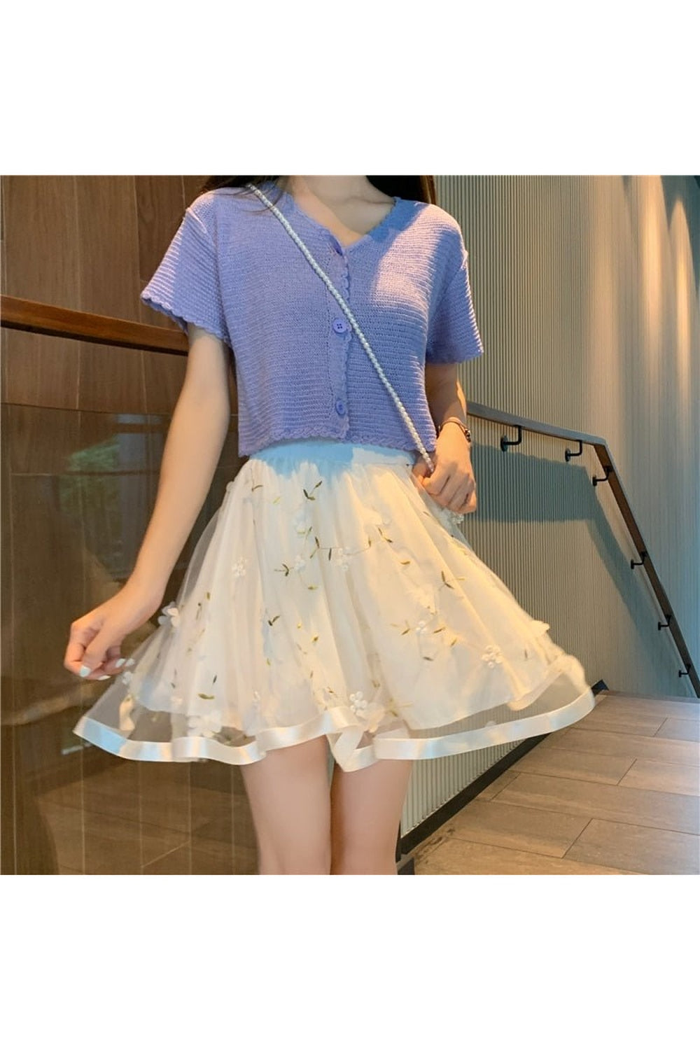Mini-jupe fleurie en maille preppy