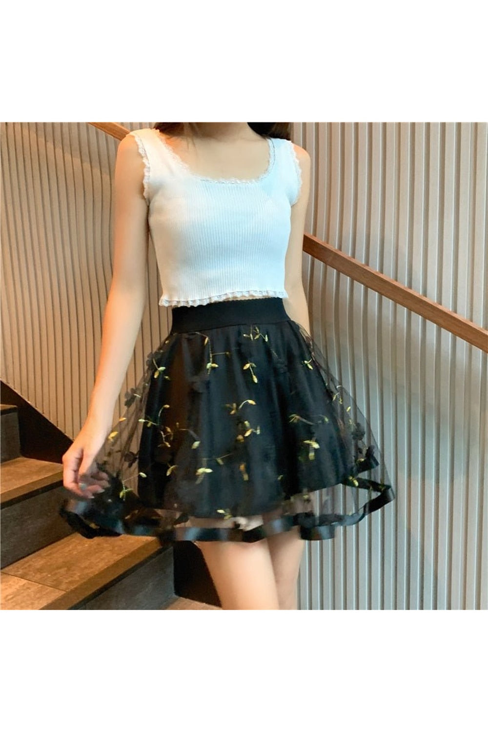 Mini-jupe fleurie en maille preppy