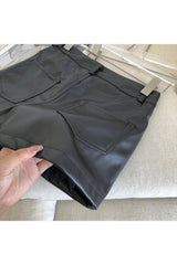 Y2K style leather mini skirt